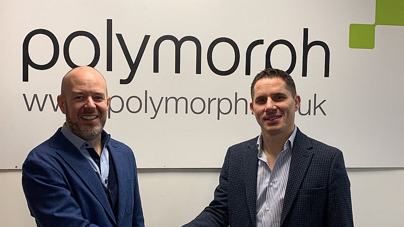 A professional photo of two men smiling while shaking hands, with the Polymorph logo visible in the background.