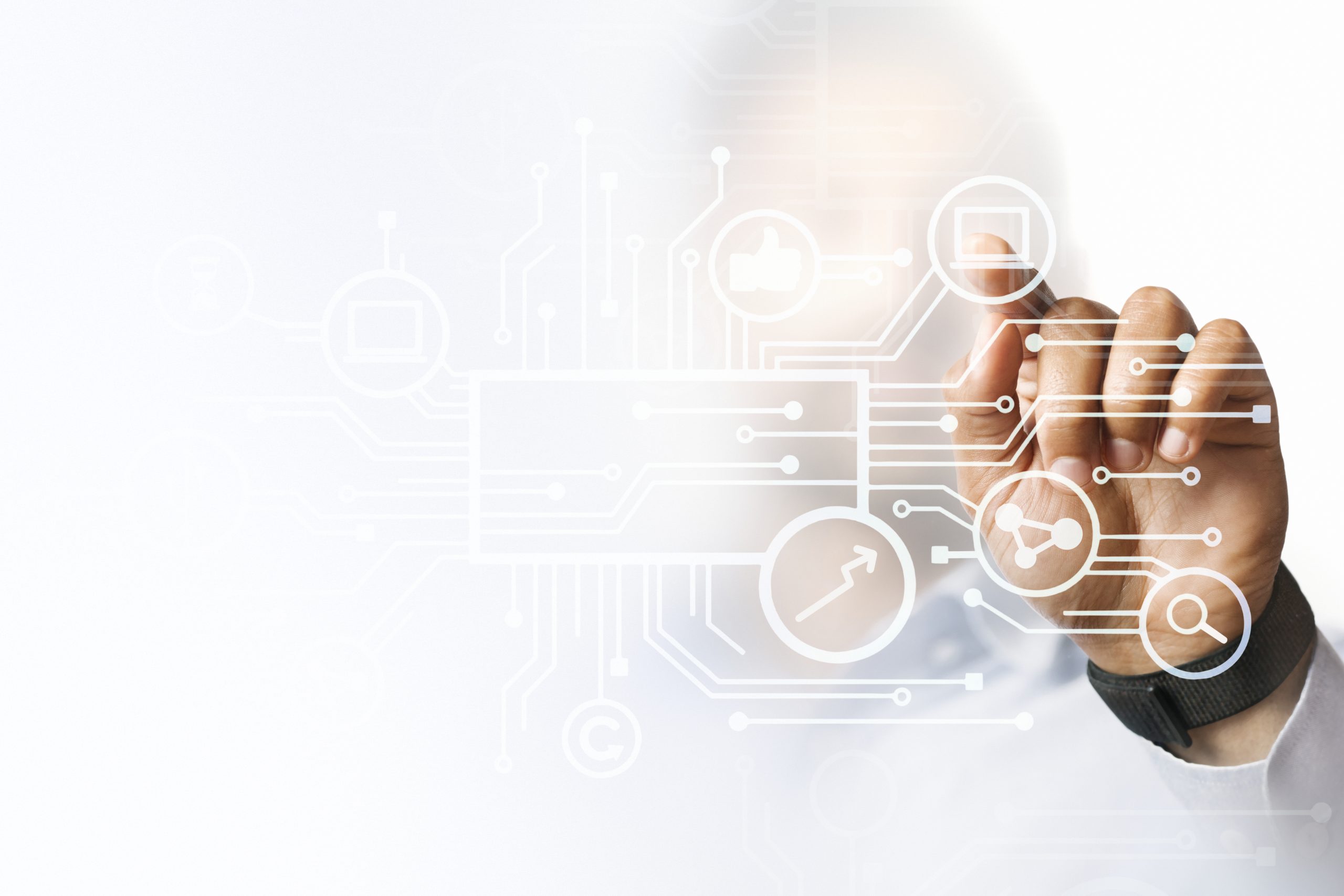 A hand touches a digital network overlay with various icons on a white background.