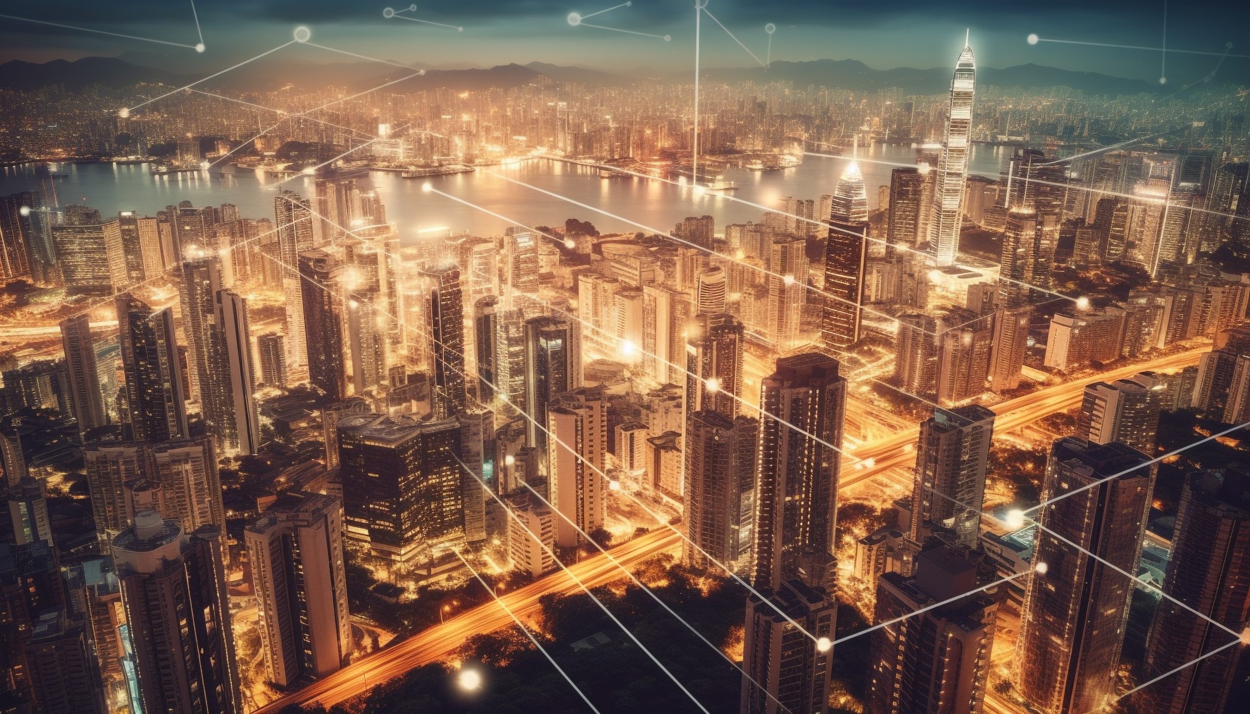 An elevated view of a city skyline at dusk, with buildings lit up and a body of water in the background. The image has a digital overlay of glowing white lines and dots connecting the buildings, suggesting a network or smart city concept. The lights on the roads and buildings appear bright orange and yellow